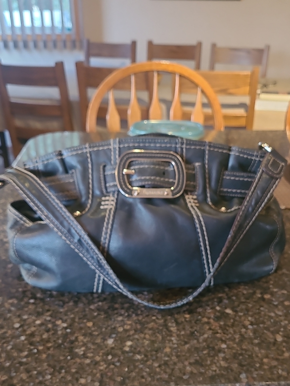 Tignanello Black Shoulder Bag with White Stitching and Buckle Accent